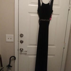 Stunning black formal gown with Embellish attached
